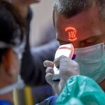 coronavirus-temperatura-medidor-reuters